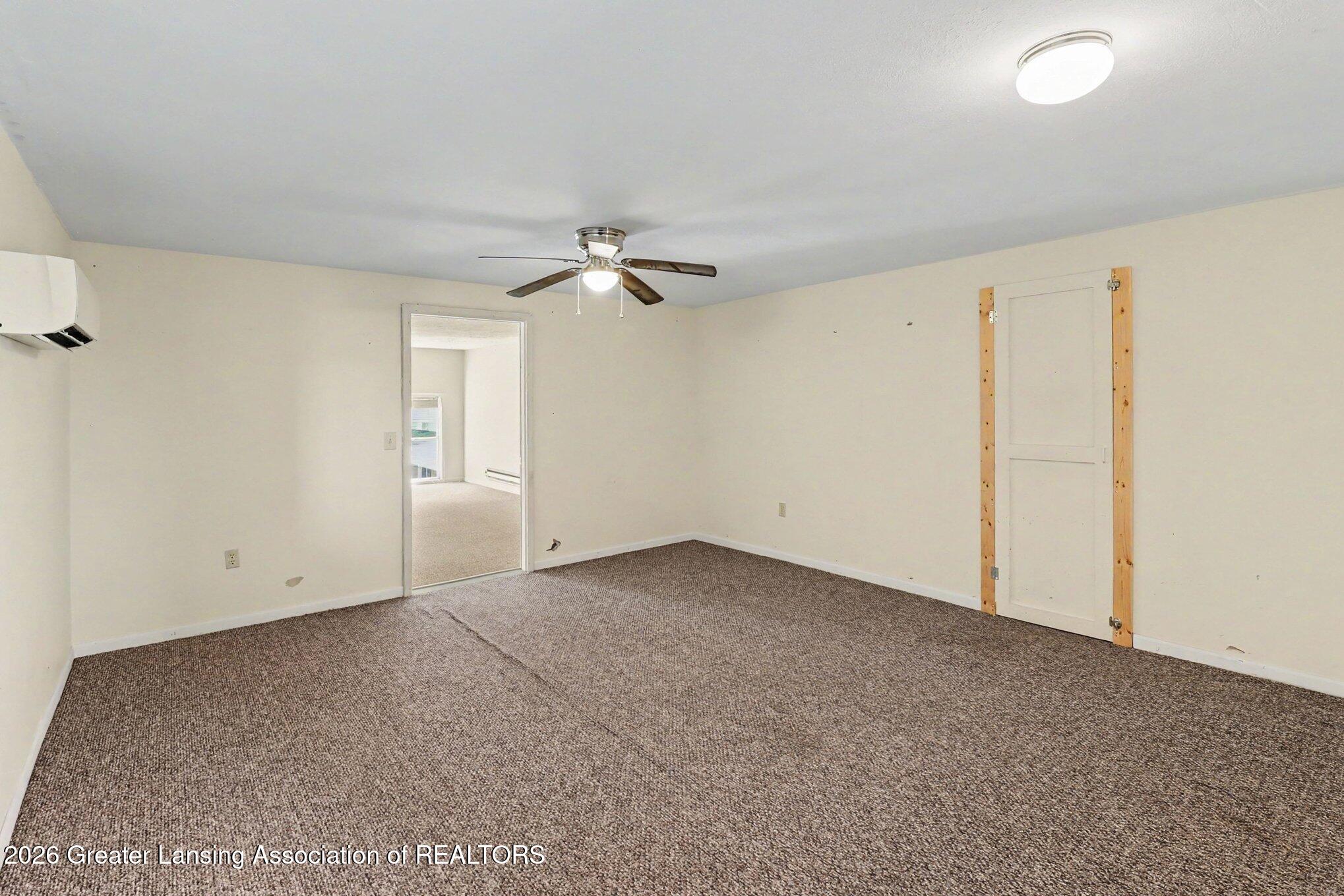 5490 West Howe Road Dewitt, MI 48820 - Photo 16 of 29 Garage bonus room 1