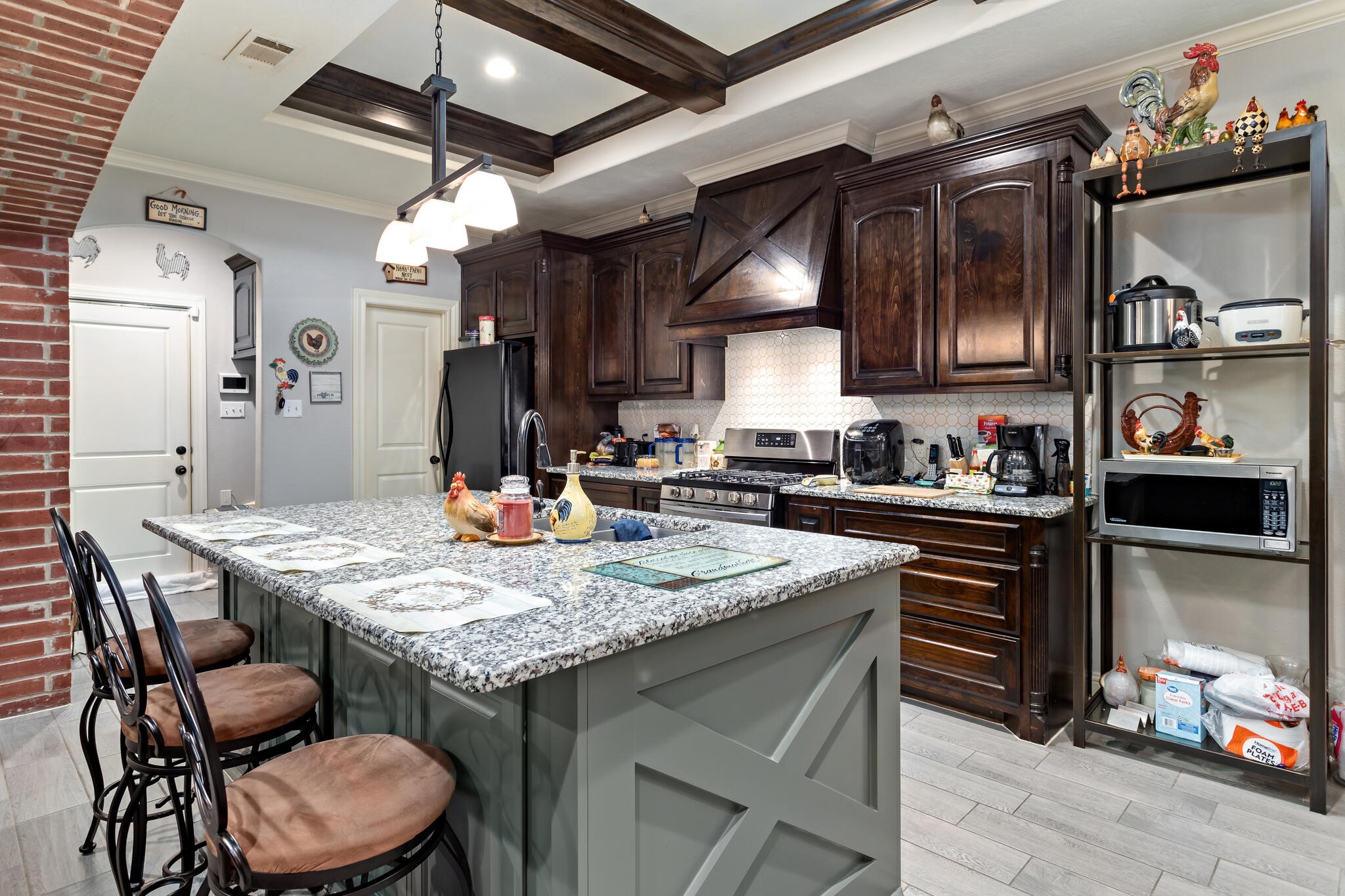 3210 Ethan Symone Street Beaumont, TX 77705 - Photo 12 of 33 a kitchen with a table and chairs in it
