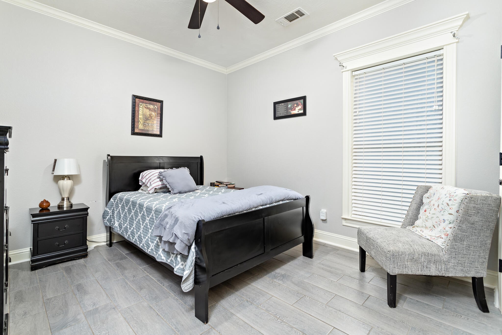 3210 Ethan Symone Street Beaumont, TX 77705 - Photo 16 of 33 a bedroom with a bed and a couch