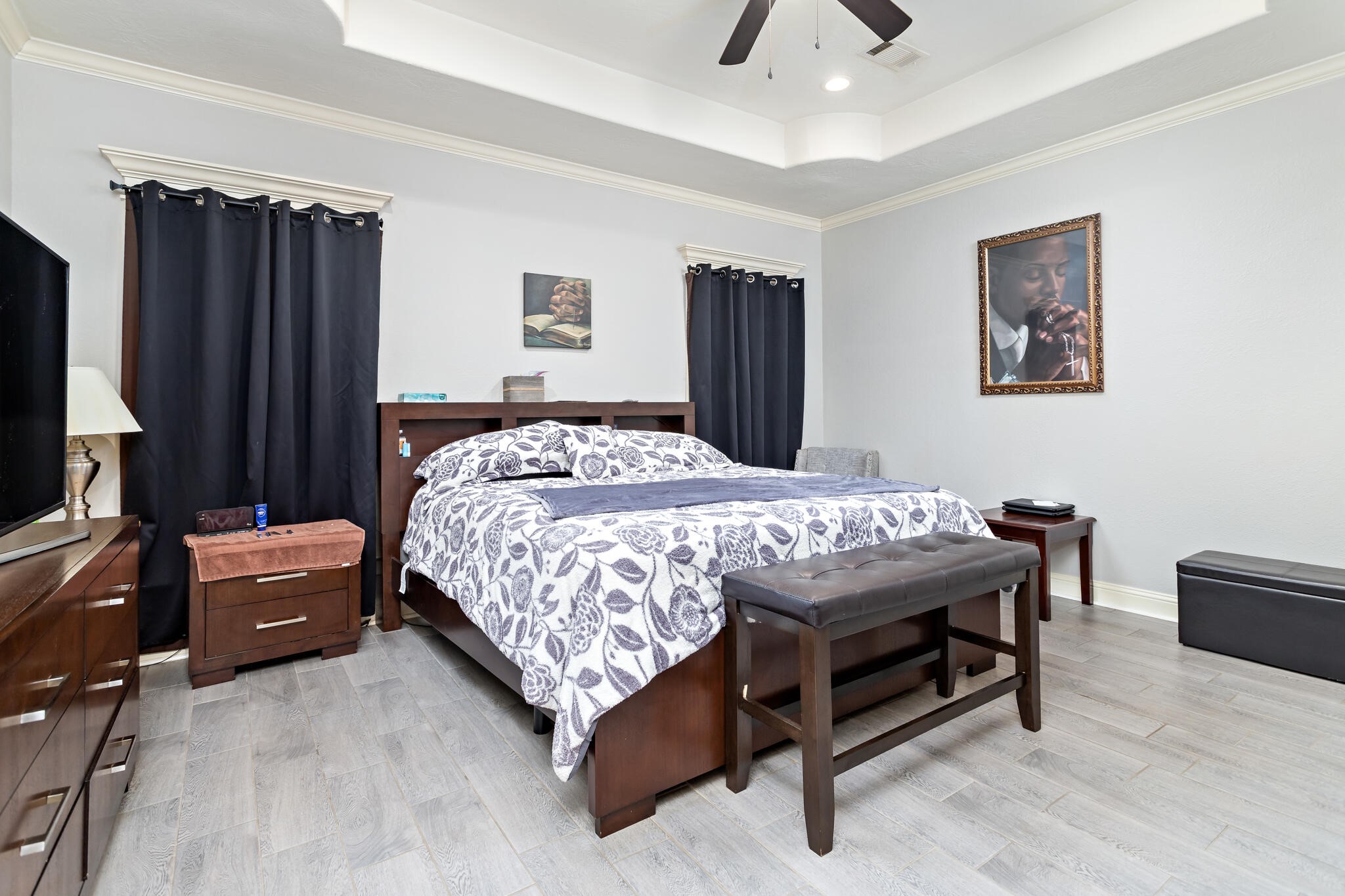 3210 Ethan Symone Street Beaumont, TX 77705 - Photo 17 of 33 a bedroom with a bed and a flat screen television