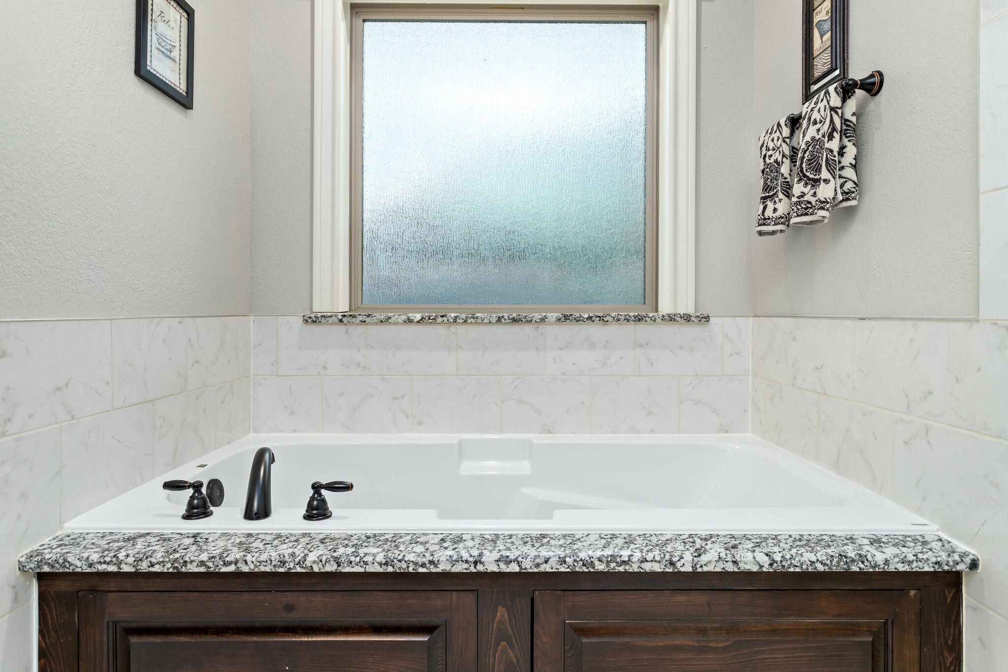 3210 Ethan Symone Street Beaumont, TX 77705 - Photo 20 of 33 a bathroom with a granite countertop sink and a mirror