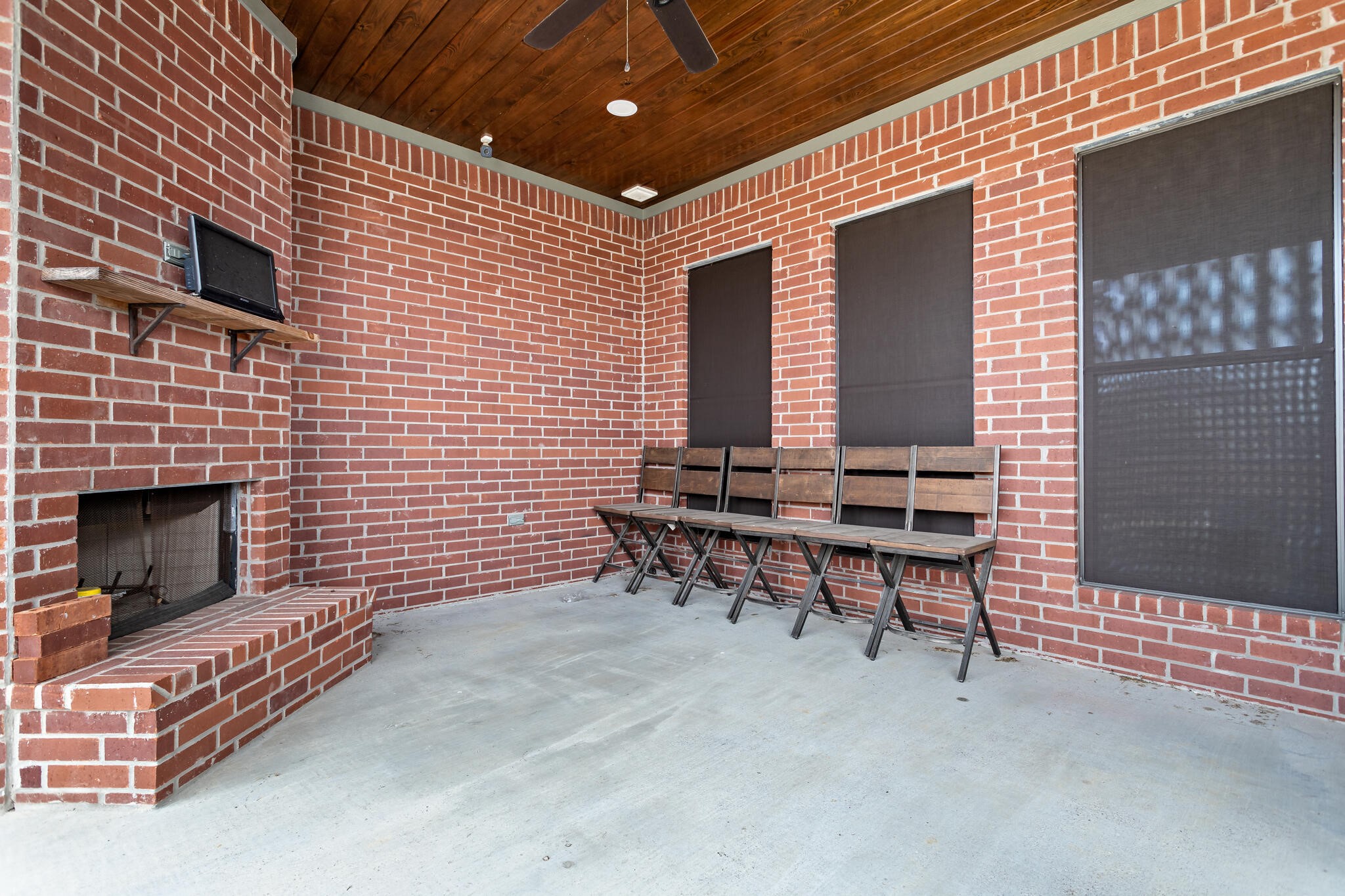 3210 Ethan Symone Street Beaumont, TX 77705 - Photo 28 of 33 a backyard of a house with outdoor seating