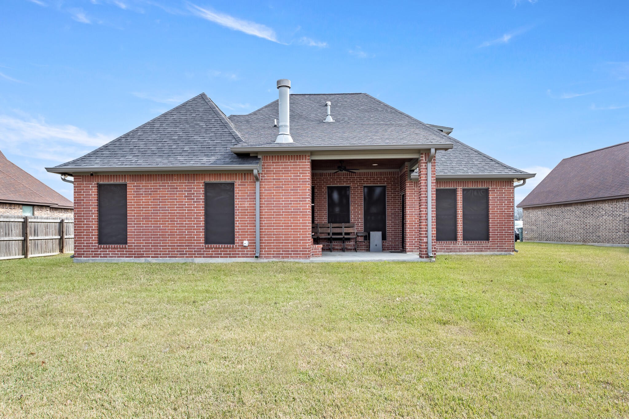 3210 Ethan Symone Street Beaumont, TX 77705 - Photo 29 of 33 a view of a house with a yard and garage