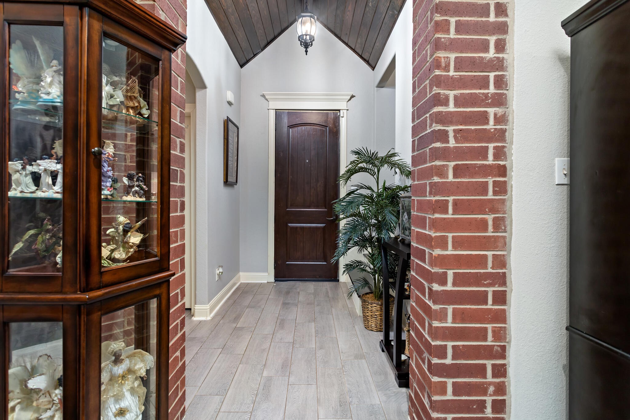 3210 Ethan Symone Street Beaumont, TX 77705 - Photo 5 of 33 a view of a door and wooden floor