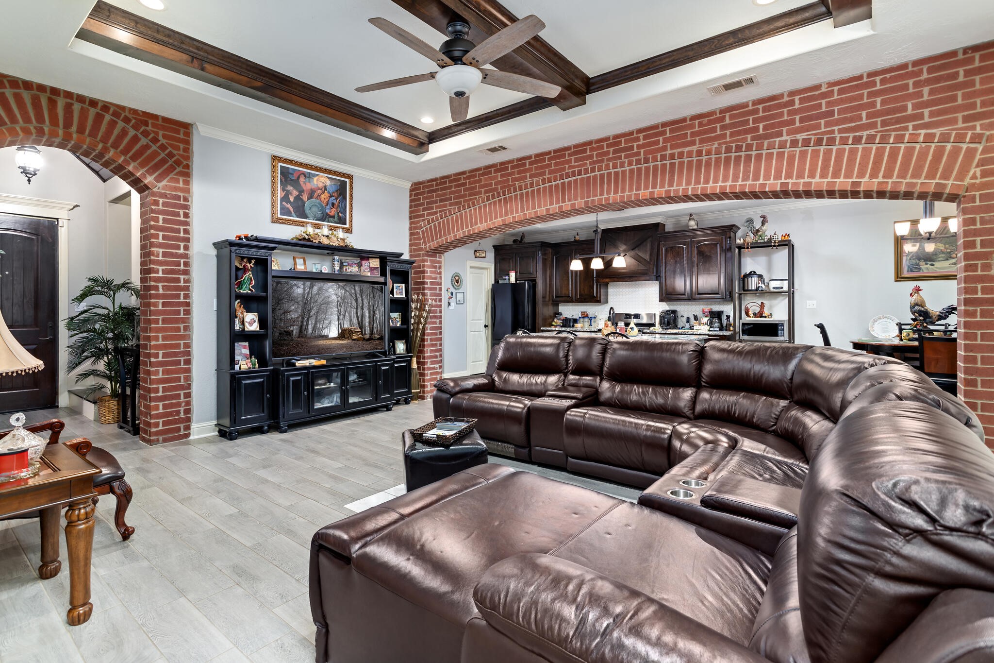3210 Ethan Symone Street Beaumont, TX 77705 - Photo 9 of 33 a living room with furniture and a flat screen tv