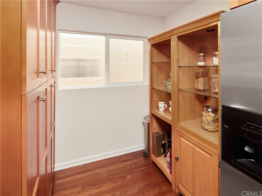 210 Whiting Street, Unit C El Segundo, CA 90245 - Photo 14 of 27 a kitchen with stainless steel appliances a refrigerator and a window