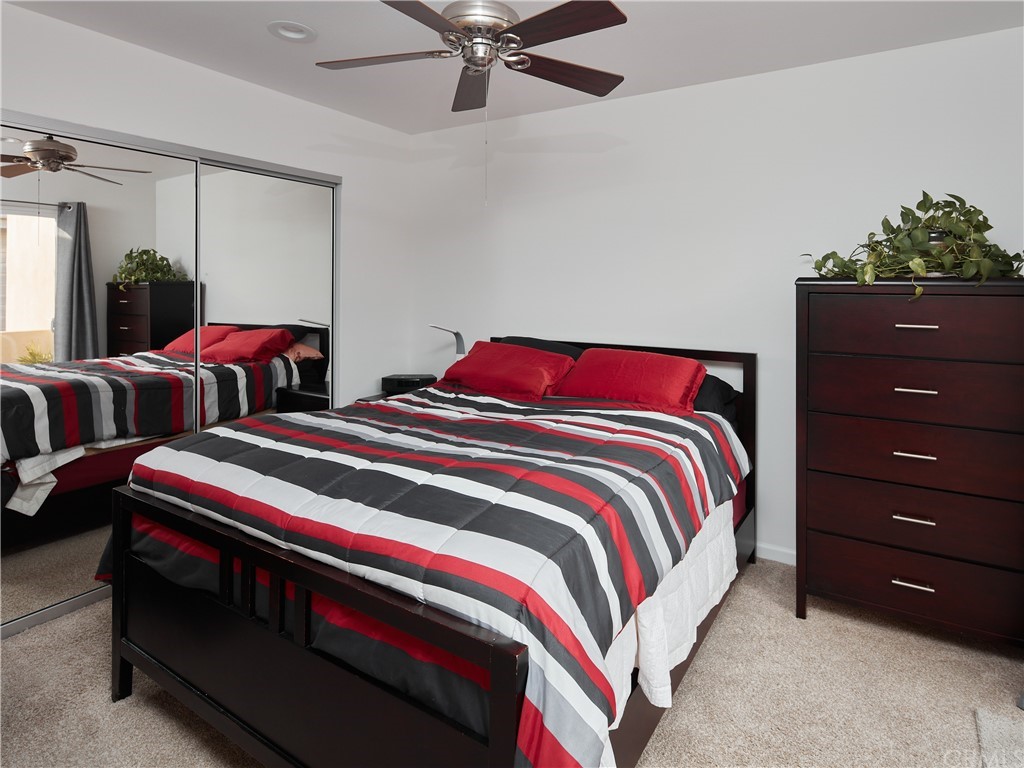 210 Whiting Street, Unit C El Segundo, CA 90245 - Photo 19 of 27 a bedroom with two beds and potted plant