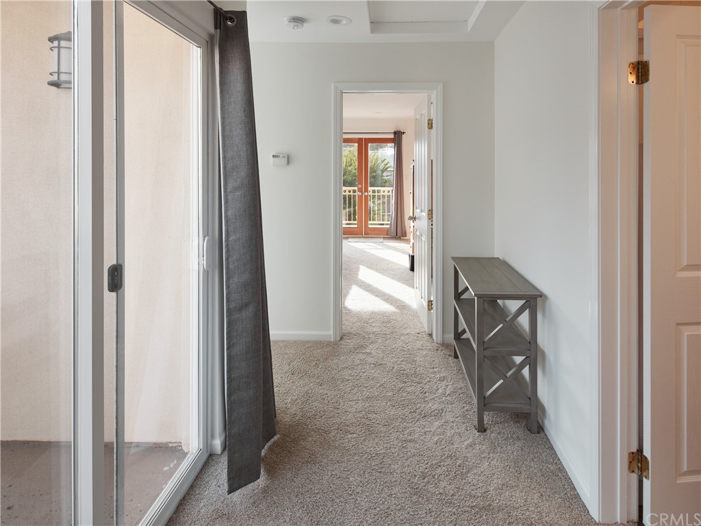 210 Whiting Street, Unit C El Segundo, CA 90245 - Photo 20 of 27 a view of a hallway with a livingroom and a chair