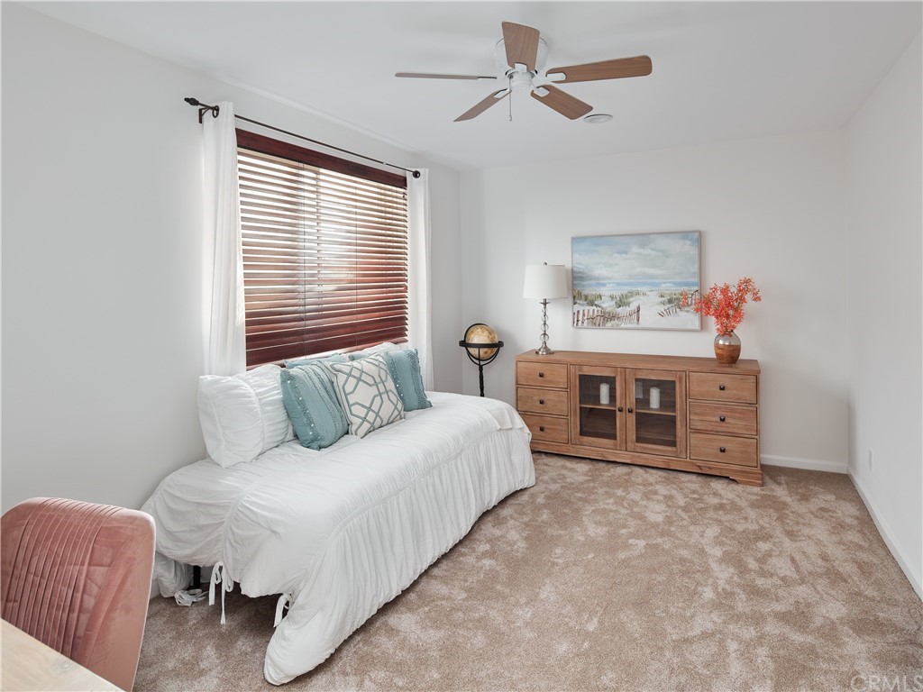 210 Whiting Street, Unit C El Segundo, CA 90245 - Photo 22 of 27 a bed room with a bed and a tv