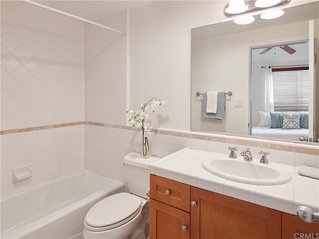 210 Whiting Street, Unit C El Segundo, CA 90245 - Photo 23 of 27 a bathroom with a sink toilet vanity and shower