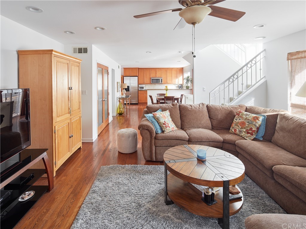 210 Whiting Street, Unit C El Segundo, CA 90245 - Photo 6 of 27 a living room with furniture and a flat screen tv