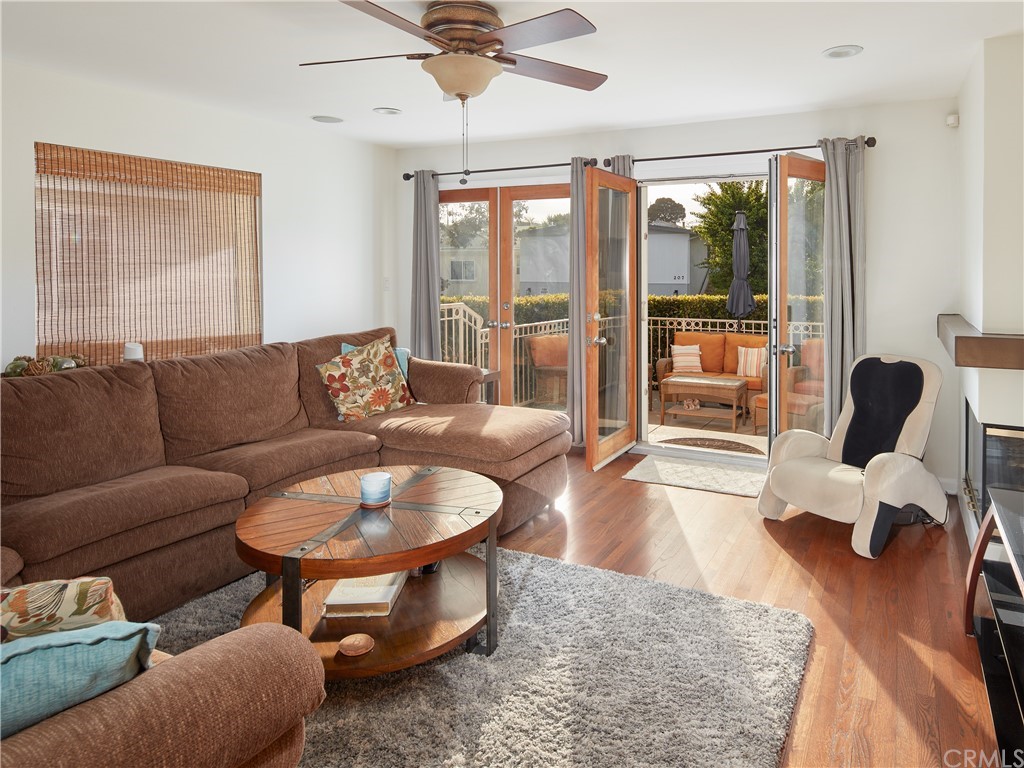 210 Whiting Street, Unit C El Segundo, CA 90245 - Photo 8 of 27 a living room with furniture and a large window