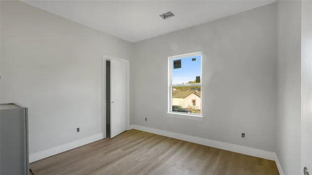 an empty room with window