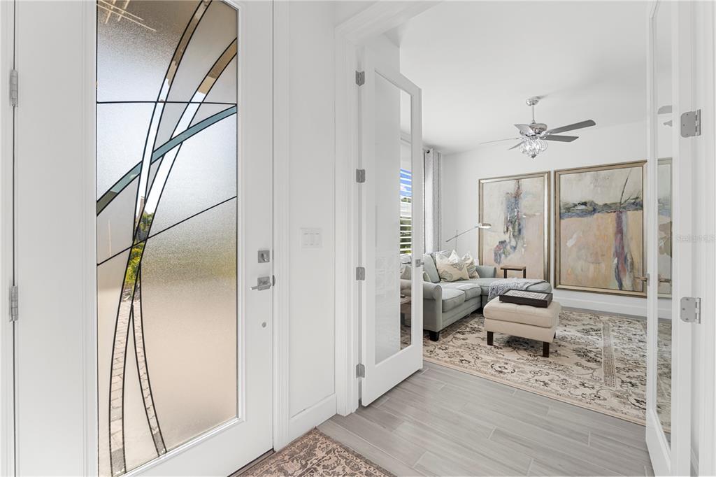 42363 Edgewater Drive Punta Gorda, FL 33982 - Photo 14 of 72 a living room with furniture and a chandelier