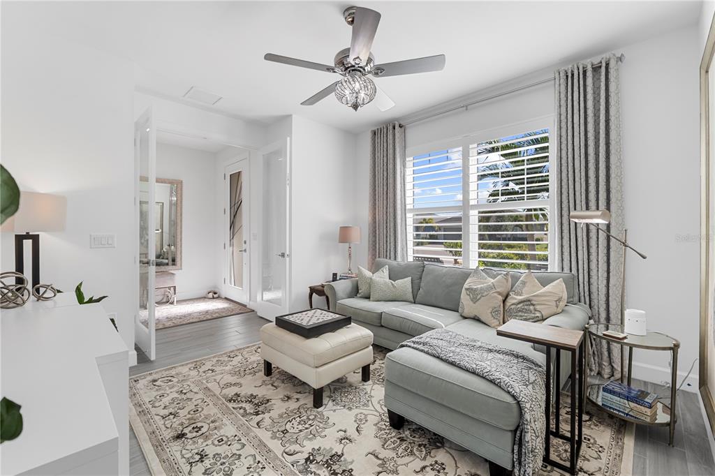 42363 Edgewater Drive Punta Gorda, FL 33982 - Photo 17 of 72 a living room with furniture and a large window