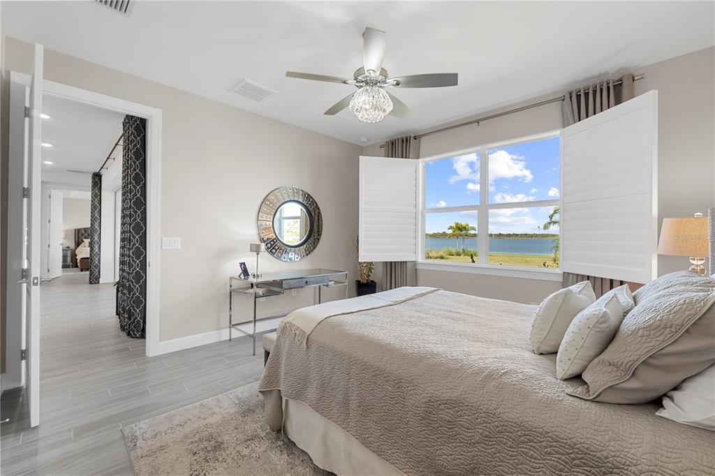 42363 Edgewater Drive Punta Gorda, FL 33982 - Photo 22 of 72 a bedroom with a bed and window