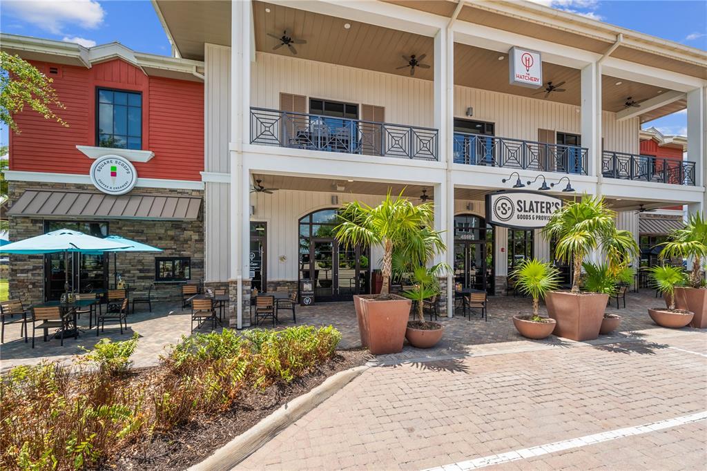 42363 Edgewater Drive Punta Gorda, FL 33982 - Photo 46 of 72 a view of a building with sitting area and garden