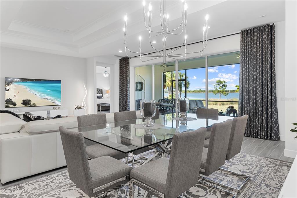 42363 Edgewater Drive Punta Gorda, FL 33982 - Photo 5 of 72 a view of a dining room with furniture window and outside view