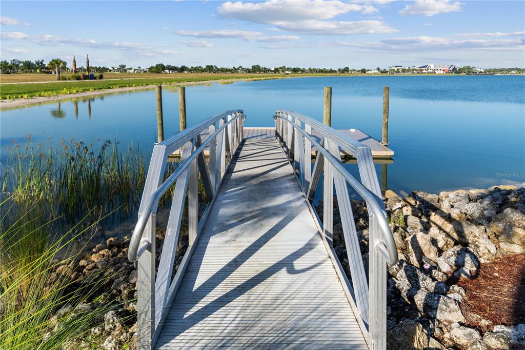 42363 Edgewater Drive Punta Gorda, FL 33982 - Photo 55 of 72 a view of a lake with a table and chairs
