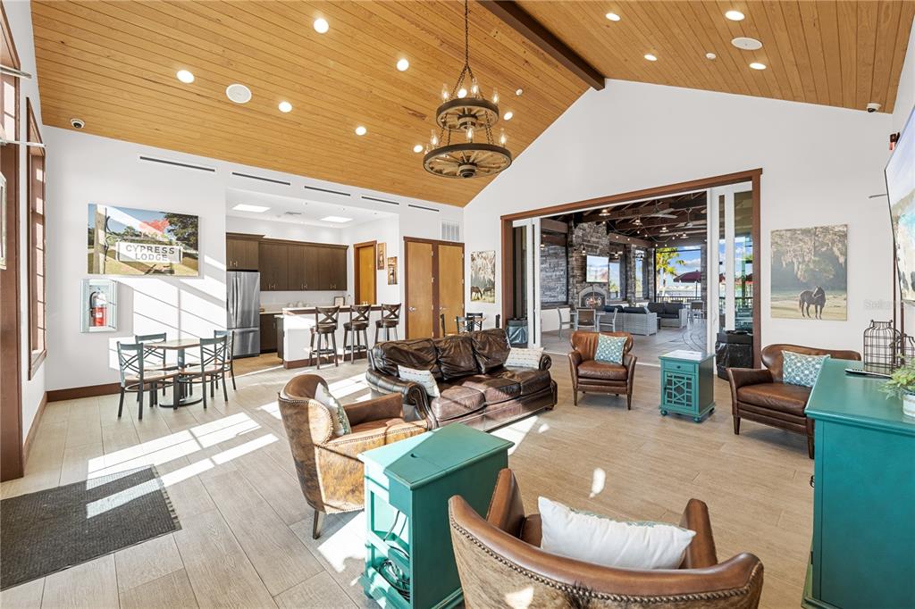 42363 Edgewater Drive Punta Gorda, FL 33982 - Photo 58 of 72 a living room with furniture and a flat screen tv