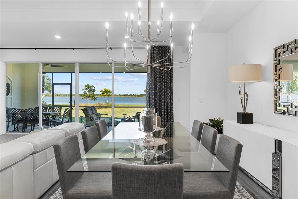 42363 Edgewater Drive Punta Gorda, FL 33982 - Photo 6 of 72 a living room with furniture and a large window