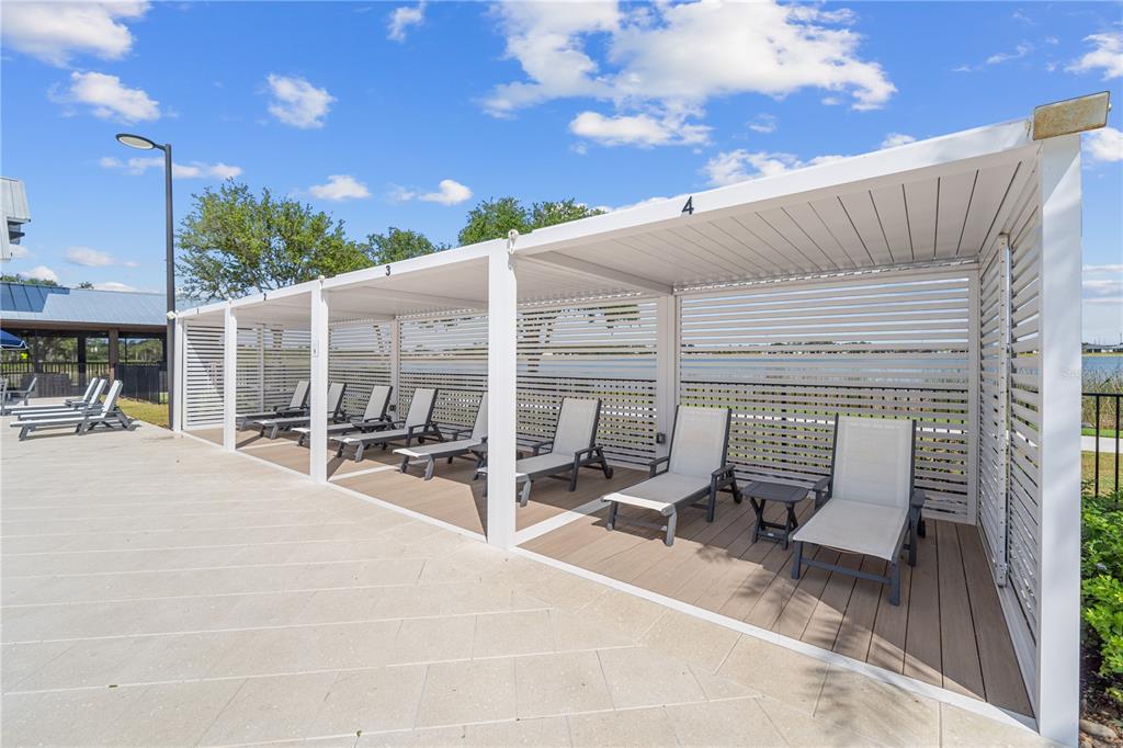 42363 Edgewater Drive Punta Gorda, FL 33982 - Photo 69 of 72 a building outdoor space with patio furniture and a potted plant
