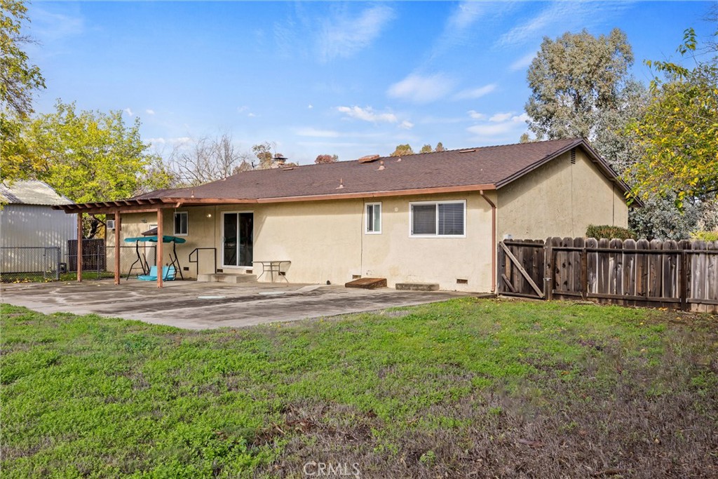4229 Caballo Way Chico, CA 95973 - Photo 39 of 42 a front view of a house with a yard and garage