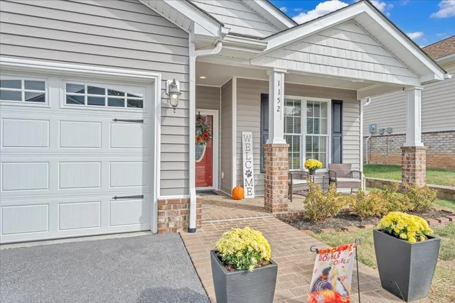 a front view of a house with patio