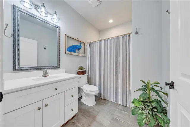 a view of a house with swimming pool and a yard