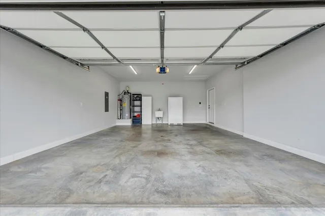 a view of a patio with couches table and chairs and potted plants