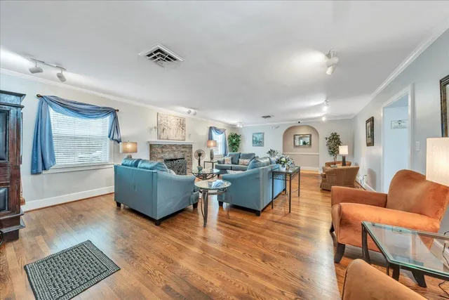 a view of a yard with large trees