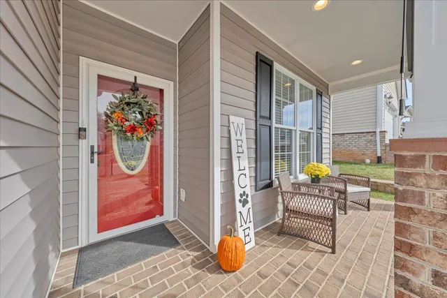 a kitchen with stainless steel appliances a refrigerator sink and cabinets