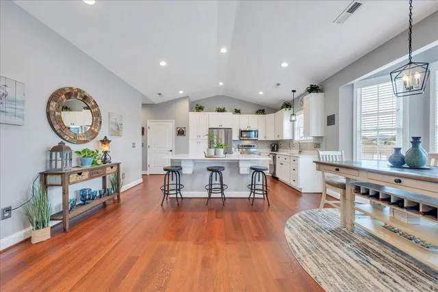 a living room with fireplace furniture and a fireplace