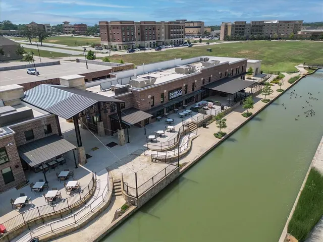 swimming pool view with a outdoor seating space