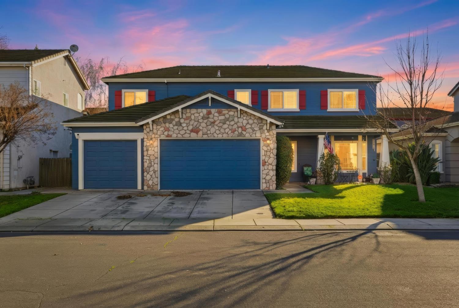 5412 Port Alice Way Salida, CA 95368 - Photo 1 of 37 a front view of a house with a yard and garage