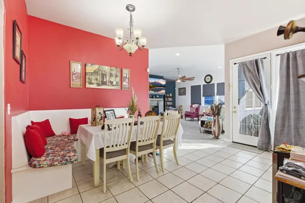 a view of a dining room with furniture