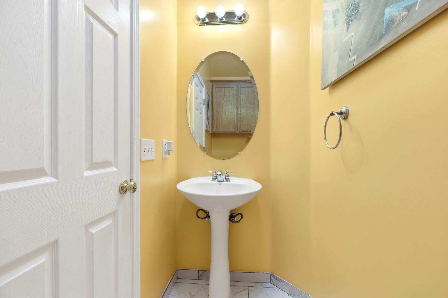 5412 Port Alice Way Salida, CA 95368 - Photo 15 of 37 a bathroom with a sink and a mirror