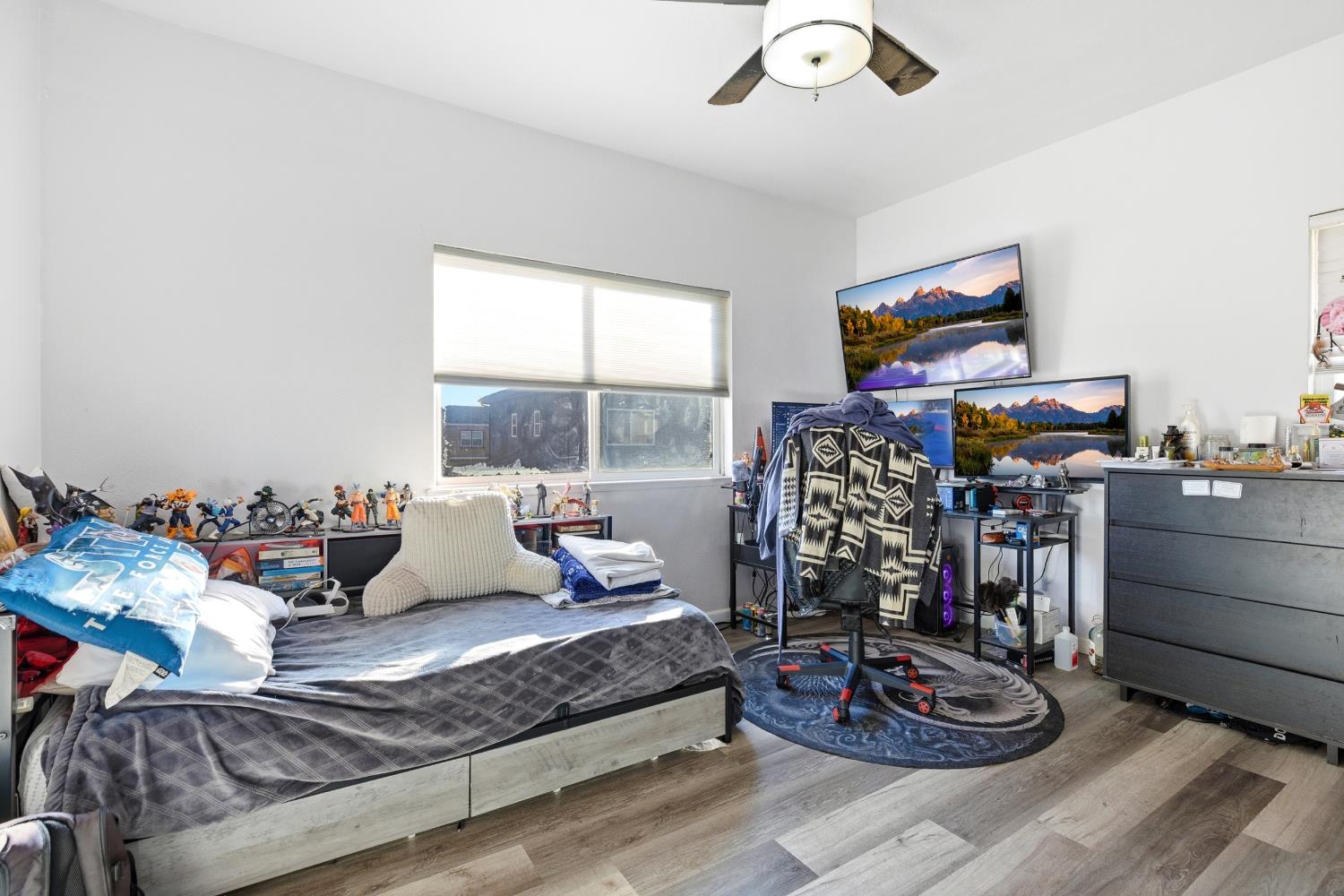 5412 Port Alice Way Salida, CA 95368 - Photo 22 of 37 a living room with furniture and a floor to ceiling window