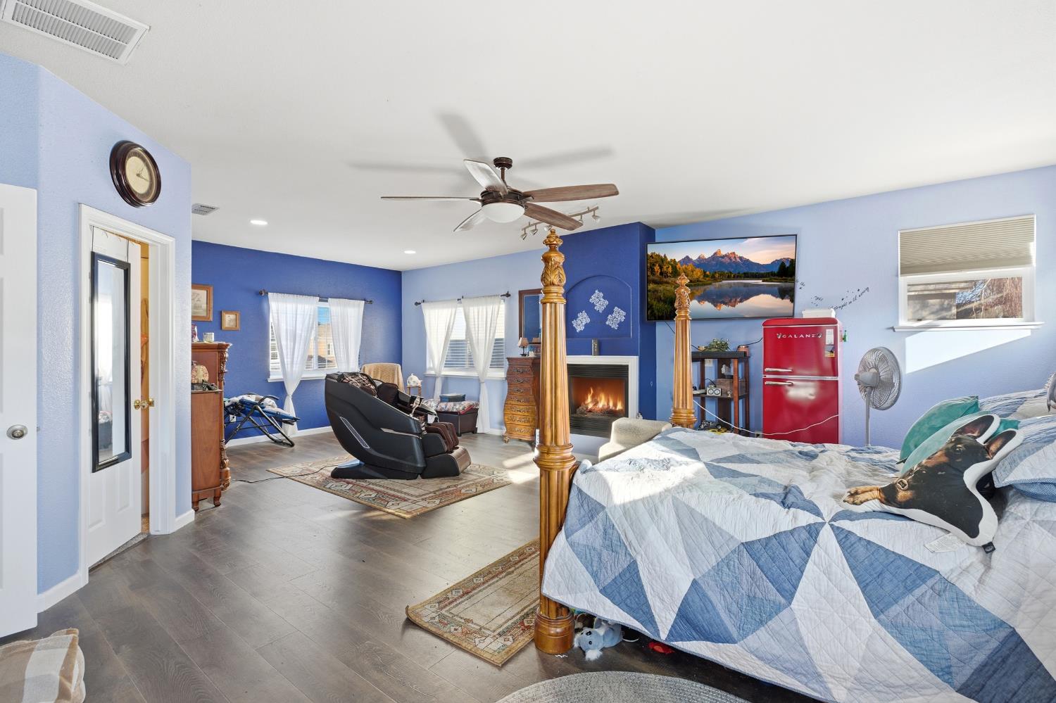 5412 Port Alice Way Salida, CA 95368 - Photo 24 of 37 a living room with furniture flat screen tv and a fireplace