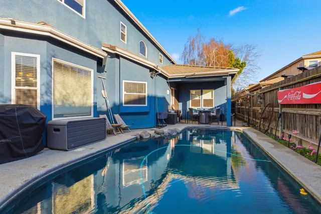 an entryway with wooden floor