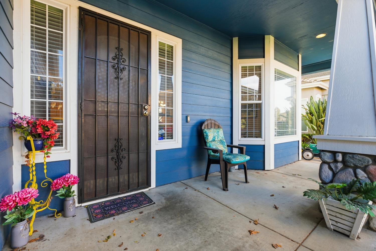 5412 Port Alice Way Salida, CA 95368 - Photo 5 of 37 a view of a house with a backyard and a chair