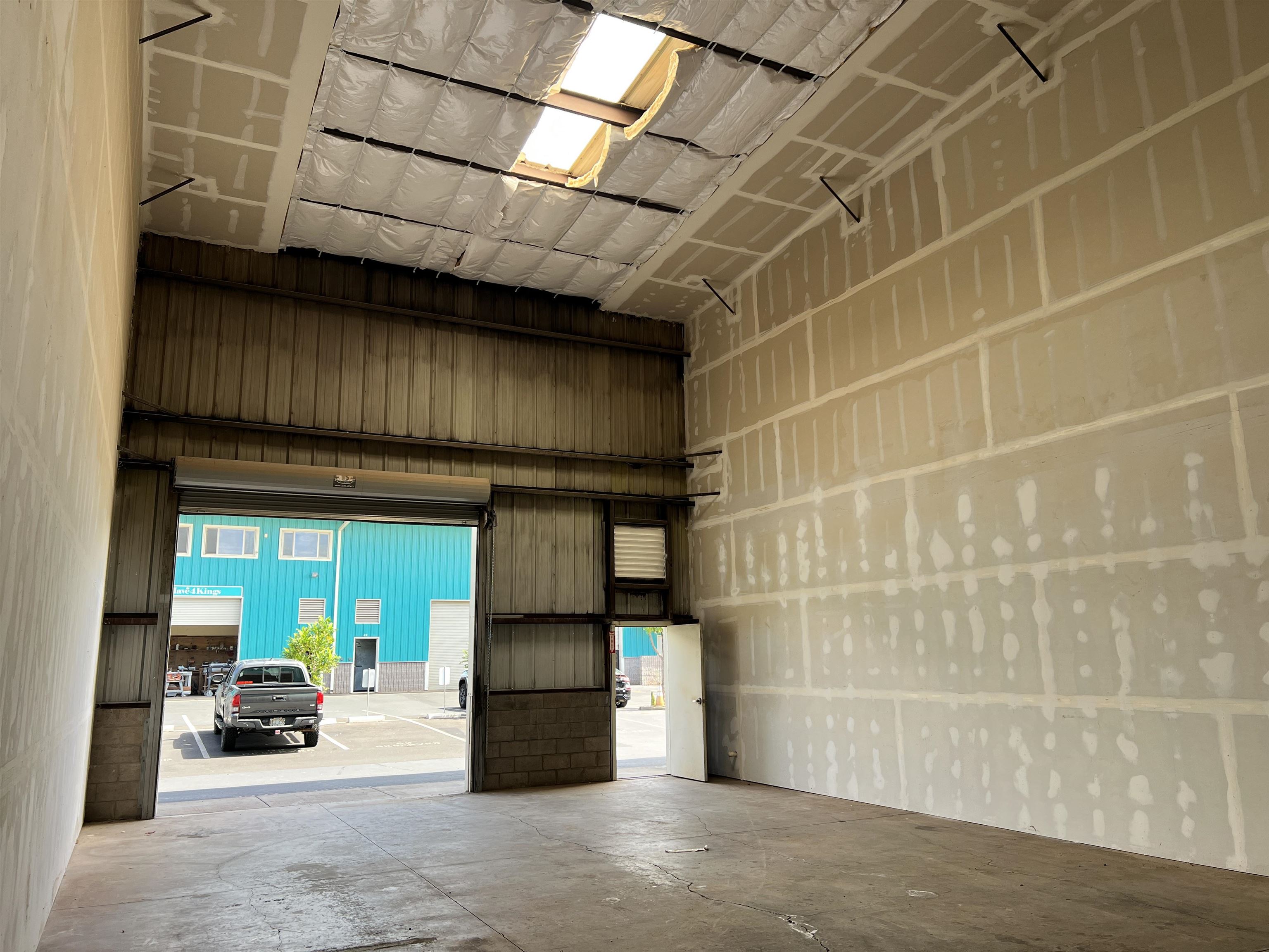 147 Kupuohi Street, Unit G3 Lahaina, HI 96761 - Photo 9 of 12 a view of a room with wooden shelves