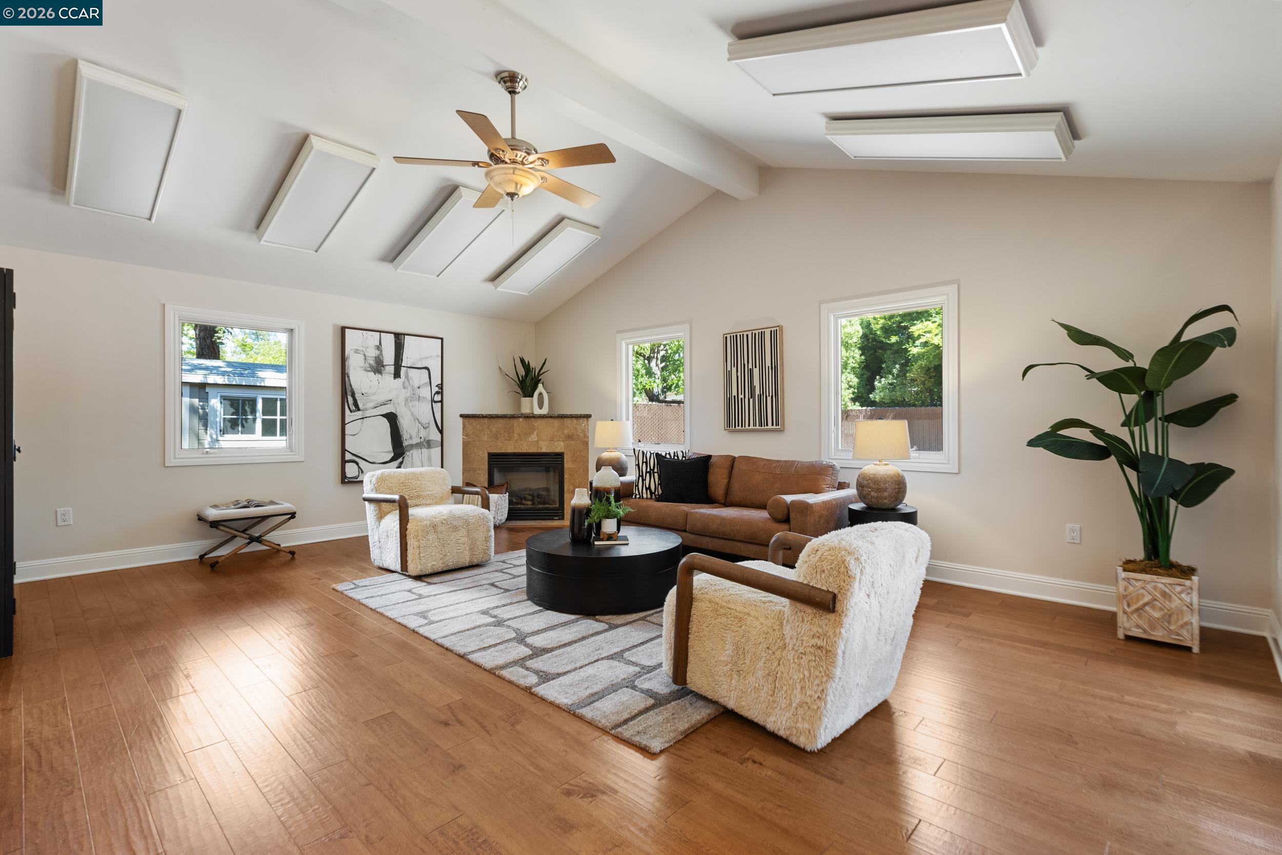 484 Diablo Road Danville, CA 94526 - Photo 18 of 39 a living room with fireplace furniture and a wooden floor