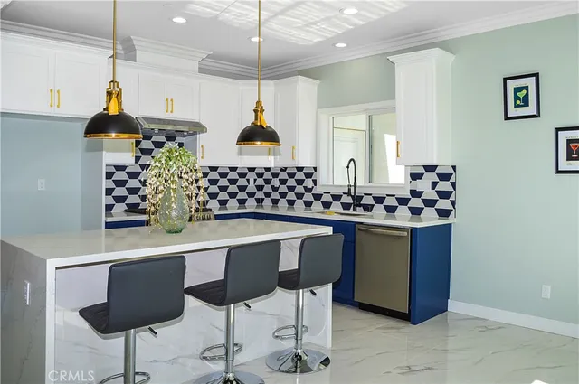 a bathroom with a sink vanity and mirror