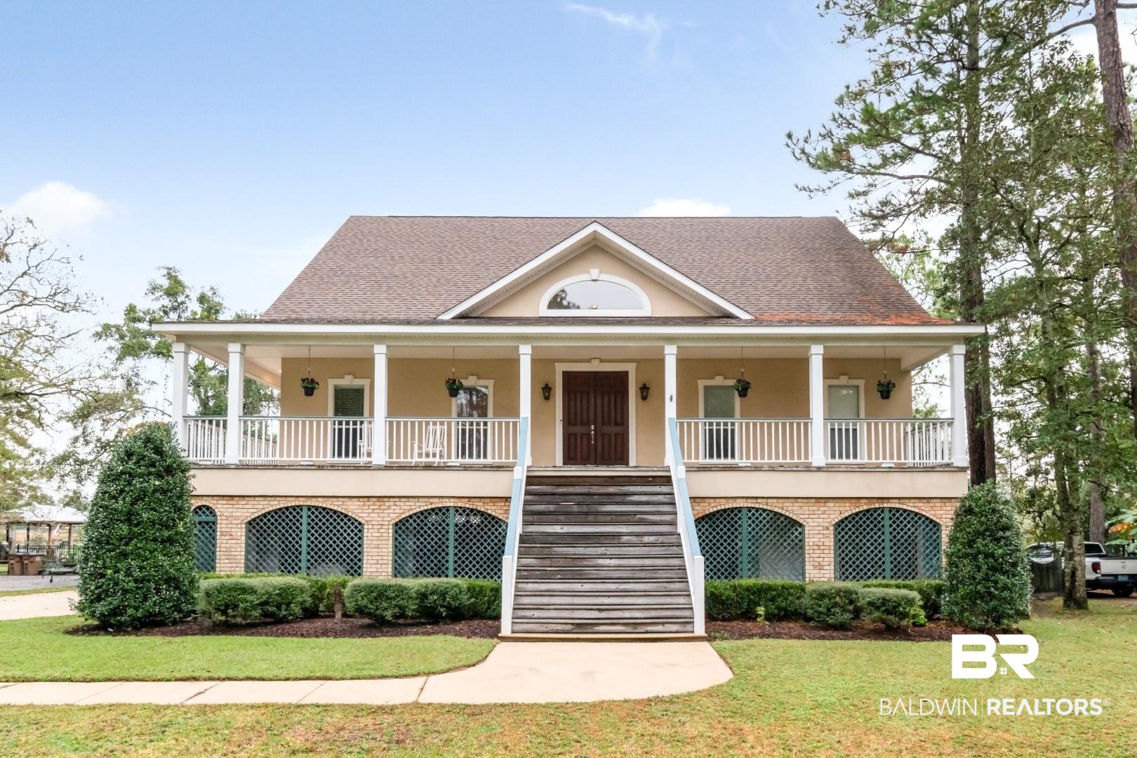 3500 North Riviere Du Chien Loop Mobile, AL 36693 - Photo 2 of 74 View of front of home featuring a front yard and a porch