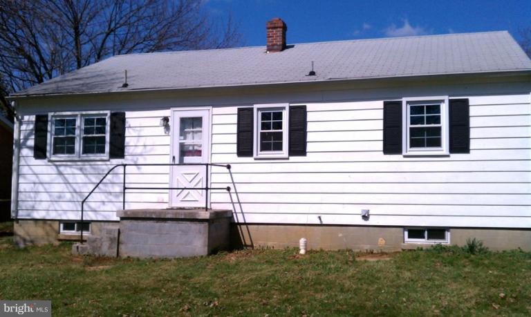 a front view of a house with garage