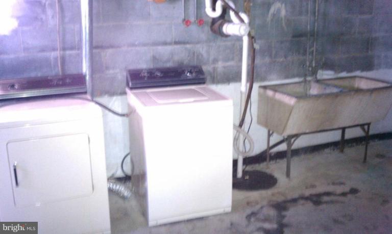 102 East Fourteenth Avenue Ranson, WV 25438 - Photo 4 of 9 a utility room with dryer and washer