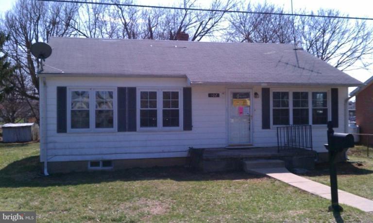 102 East Fourteenth Avenue Ranson, WV 25438 - Photo 5 of 9 a front view of a house with a yard