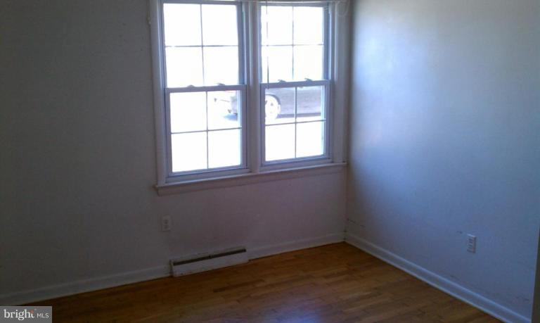 102 East Fourteenth Avenue Ranson, WV 25438 - Photo 6 of 9 an empty room with a window