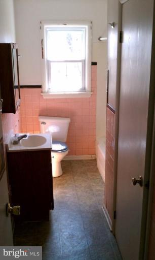 102 East Fourteenth Avenue Ranson, WV 25438 - Photo 7 of 9 a bathroom with a sink toilet and shower